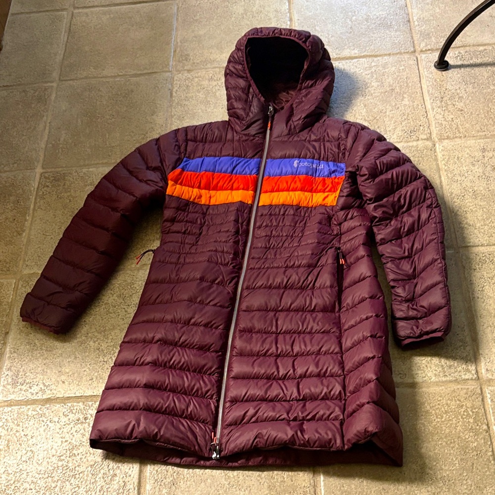 Cotopaxi Brown Hooded Puffer Jacket with Orange and Blue Stripes